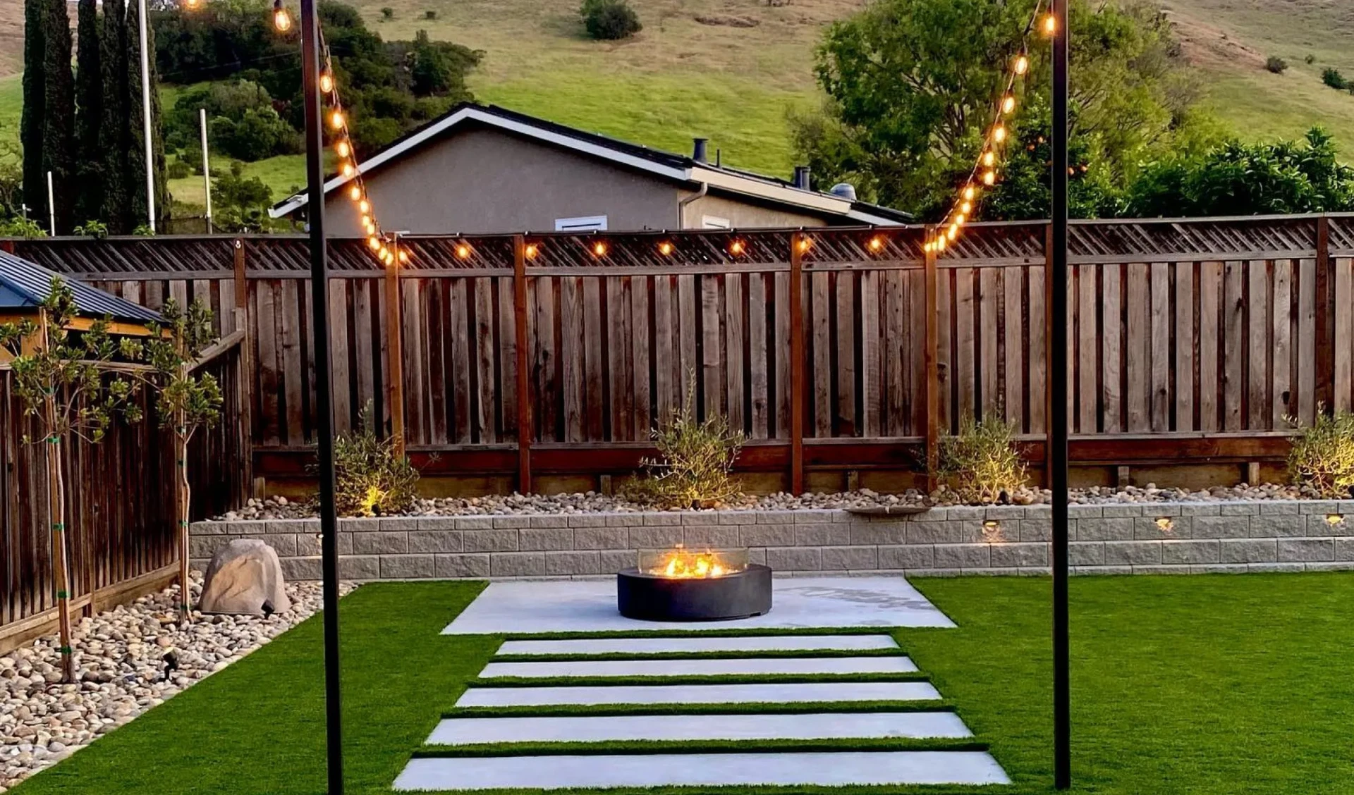 Lush landscaped front yard with vibrant green grass